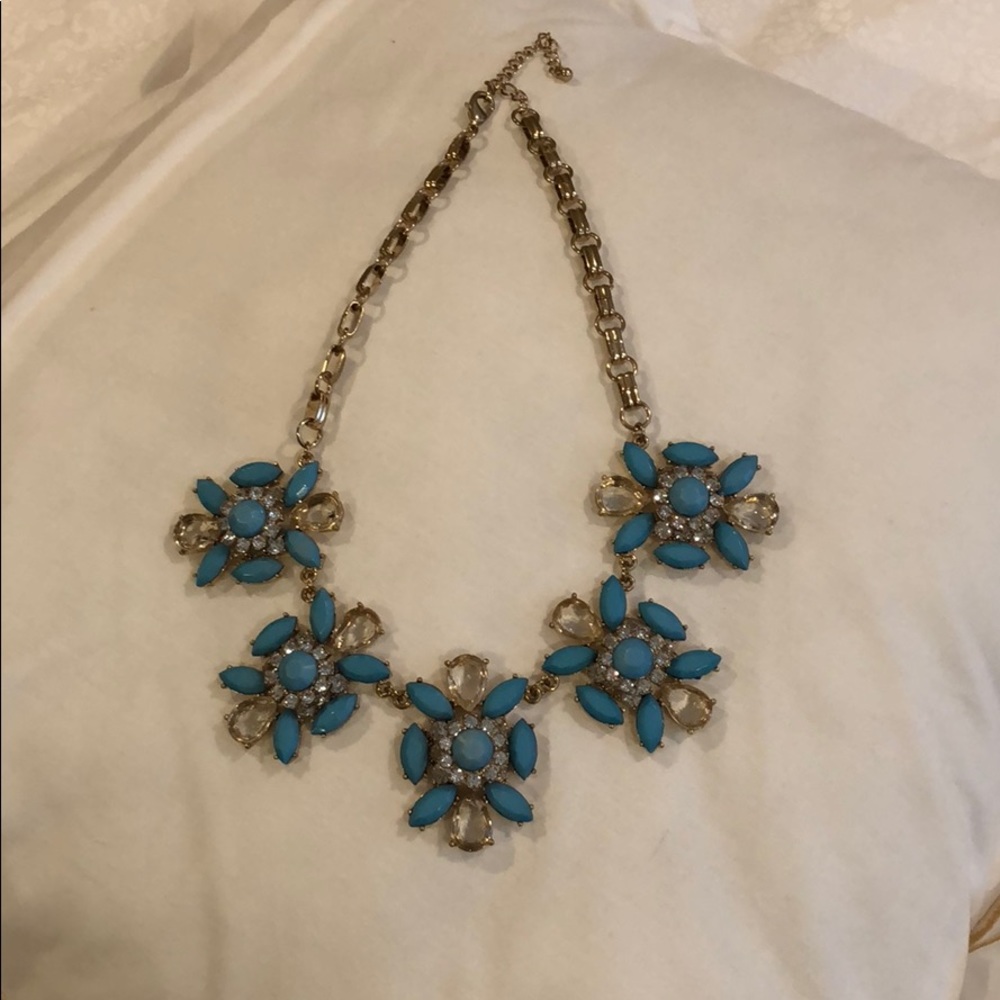 Gold tone and turquoise statement necklace.